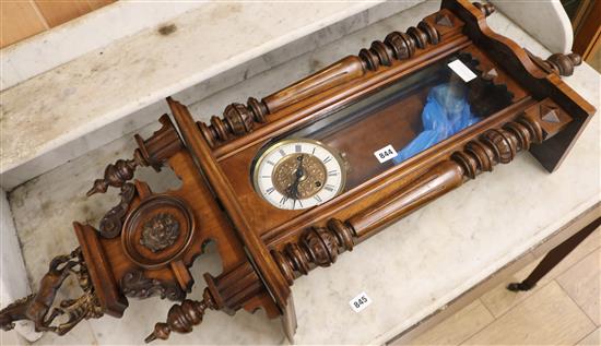 A Vienna style walnut wall clock W.40cm